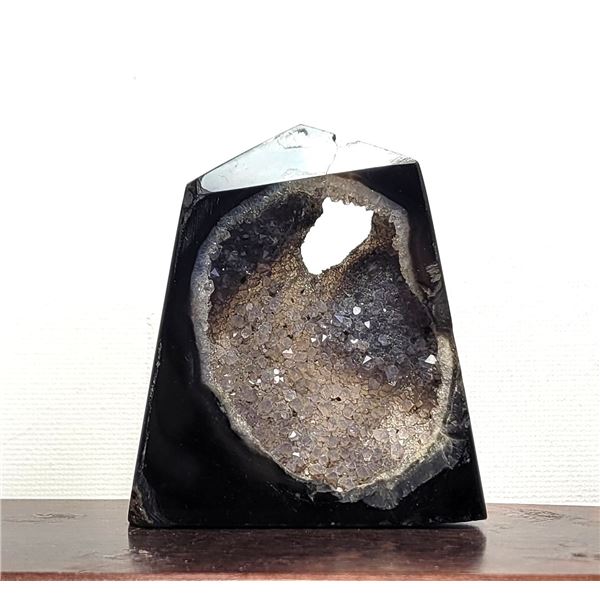 1) NATURAL BLACK ONYX GEODE, 48.09 GRAMS.