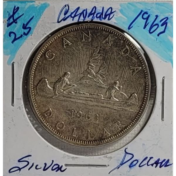 26)  CANADIAN 1963 80% SILVER  $1.00 COIN.