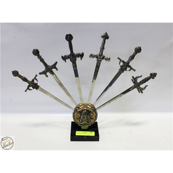 SIX SWORD LETTER OPENERS IN HOLDER DIFFERENT