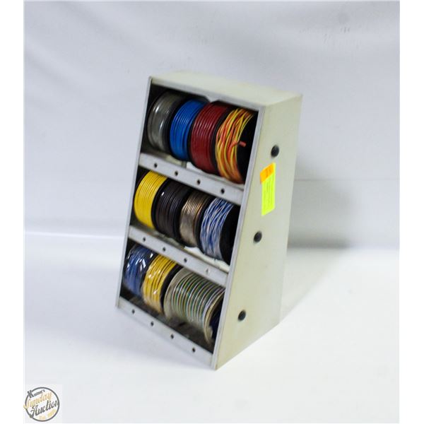 11 SMALL SPOOLS OF WIRE ON TABLE TOP HOLDER RACK