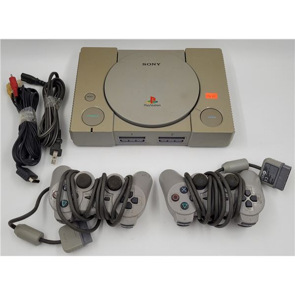 PlayStation Console w/ Controllers & Cables