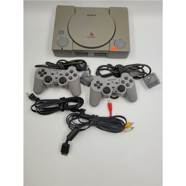 PlayStation Console w/ 2 Controllers, War Zone Disc, & Cables