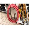Image 2 : Multiple Cleaning Tools: Hose, Mops, Caution Signs, etc