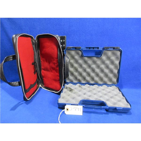 2 Handgun Cases - Doskocil Hard Case and a Leather Soft Case