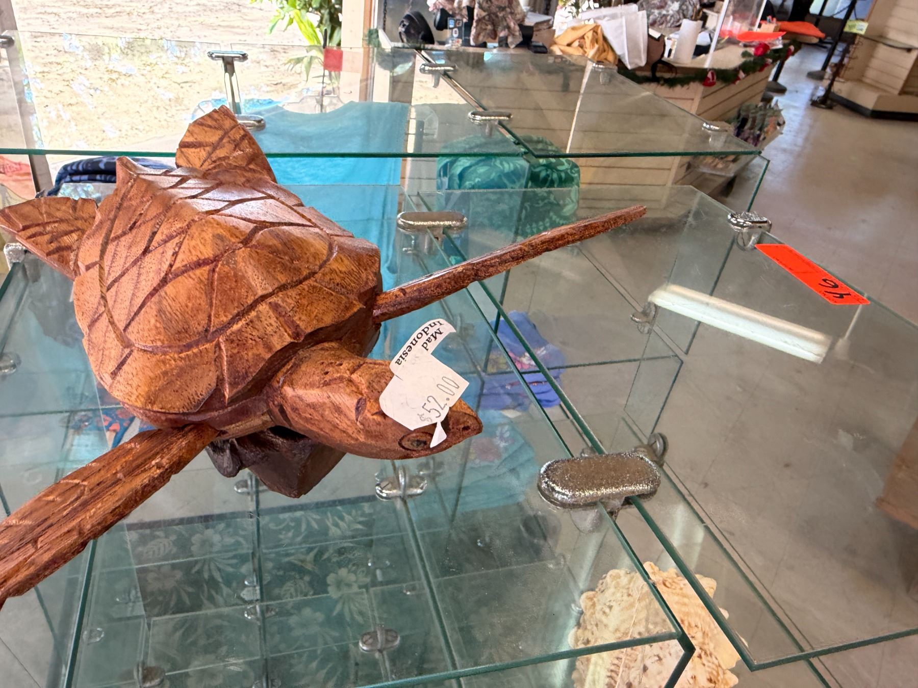 Display A Turtle Shell Contents of Display: Wooden Turtle, Shells, Helmets, Tikis, Bowls, etc ...