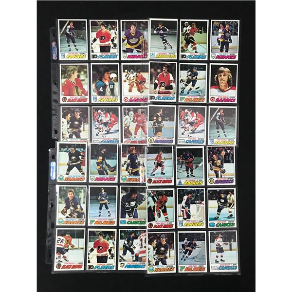 LARGE LOT OF VINTAGE HOCKEY TRADING CARDS IN PLASTIC SLEEVES