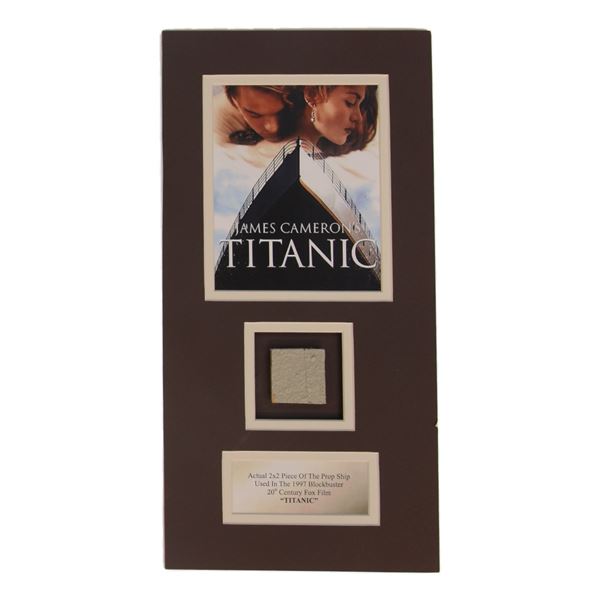 TITANIC MOVIE PRESENTATION PIECE INCLUDING 2X2 PIECE OF THE PROP SHIP USED IN THE MOVIE - COA