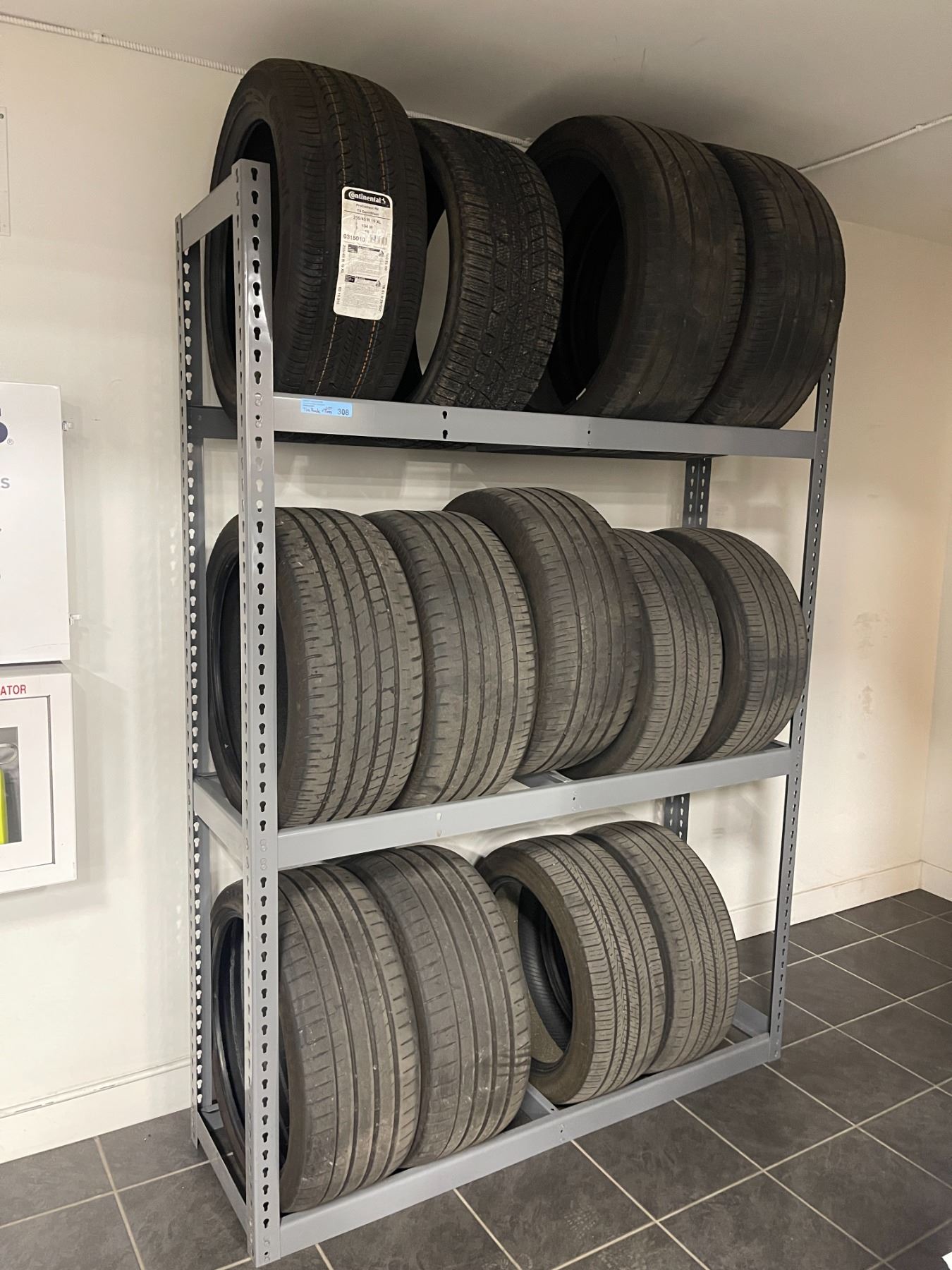 Tire Rak Tire rack w/ (x14) tires (Various tires) - Rack 18.5x61x84