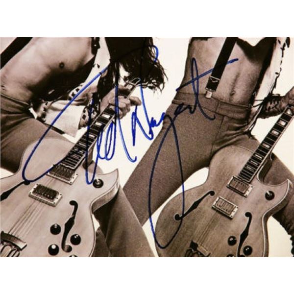 Framed Ted Nugent signed album
