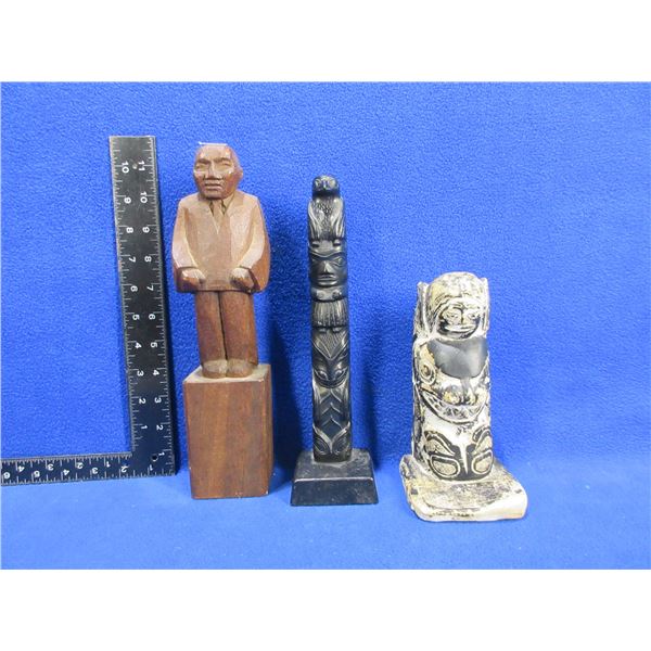 2 Totem Poles & Carved Wooden Man - 1 totem pole has a base repair
