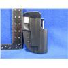 Image 1 : Uncle Mike's Kydex Size 22 Holster with Belt Mount - Fits Sig Sauer 220/226