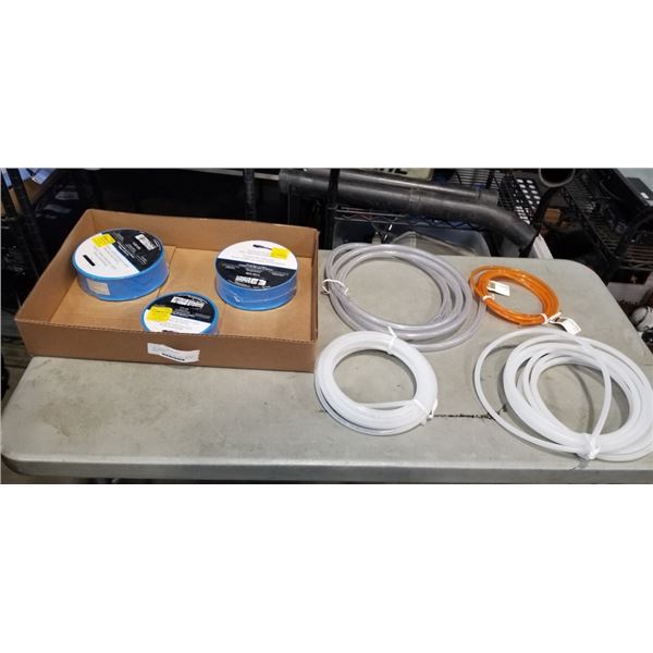 BOX OF NEW OUTFLOW HOSE, WATER LINE AND MORE