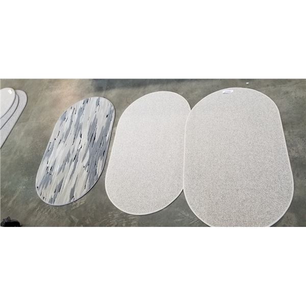 3 AS NEW 48 INCH OVAL FLOOR MATTS