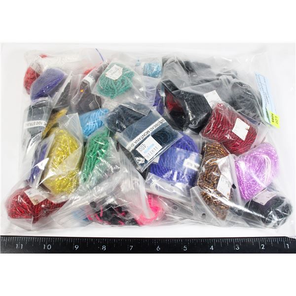 LOT OF VARIOUS COLORED SEED BEAD STRINGS