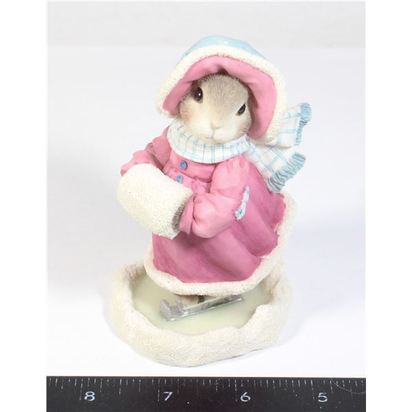 CERAMIC RABBIT FIGURE ON ICE SKATES