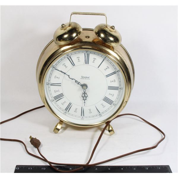 VINTAGE UNITED PLUG IN CLOCK MADE IN USA TESTED