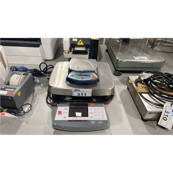 TWO OHAUS DIGITAL SCALES; ELECTRIC RANGER 7000 AND PORTABLE BATTERY OPERATED SCOUT PRO