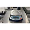Image 2 : TWO OHAUS DIGITAL SCALES; ELECTRIC RANGER 7000 AND PORTABLE BATTERY OPERATED SCOUT PRO