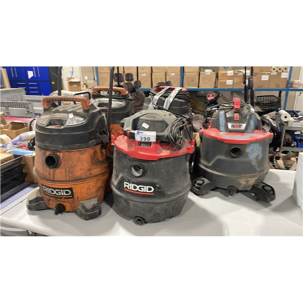 4 RIGID WET/DRY VACUUMS AND 1 NXT WET/DRY VACUUM
