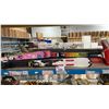 Image 3 : SHELF OF ASSORTED SKIS & SKI BOOTS