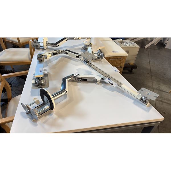 HUMAN SCALE DUAL ARTICULATING MONITOR STAND