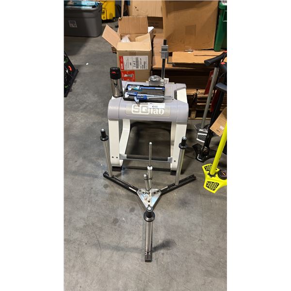 ASSORTED MEASURING TOOLS INCL PARK TOOL CALIPERS, NOBLE LACING STAND AND SQLAB SIT BONE