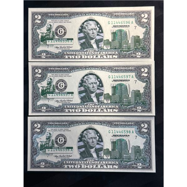 UNCIRCULATED SERIES 2003 $2 BILLS THAT HAVE BEEN COLORIZED WITH MINNESOTA-SPECIFIC OVERLAY; LOT OF 3