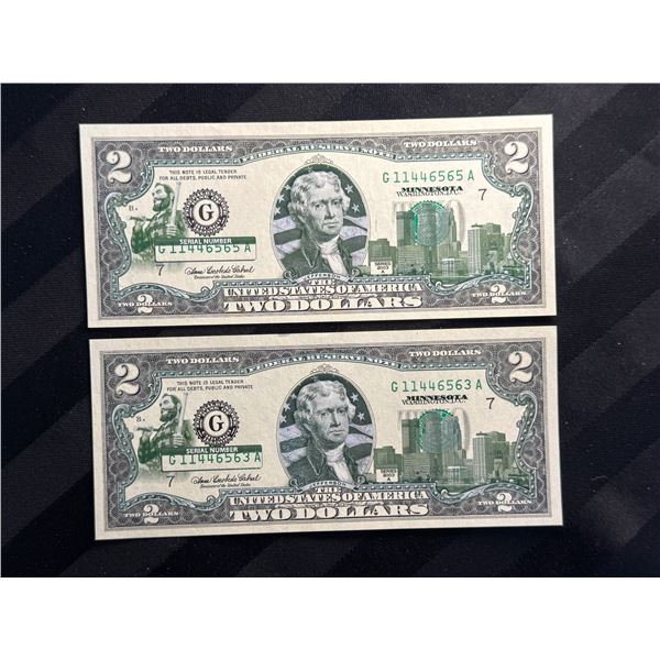 UNCIRCULATED SERIES 2003 $2 BILLS THAT HAVE BEEN COLORIZED WITH MINNESOTA-SPECIFIC OVERLAY; LOT OF 2