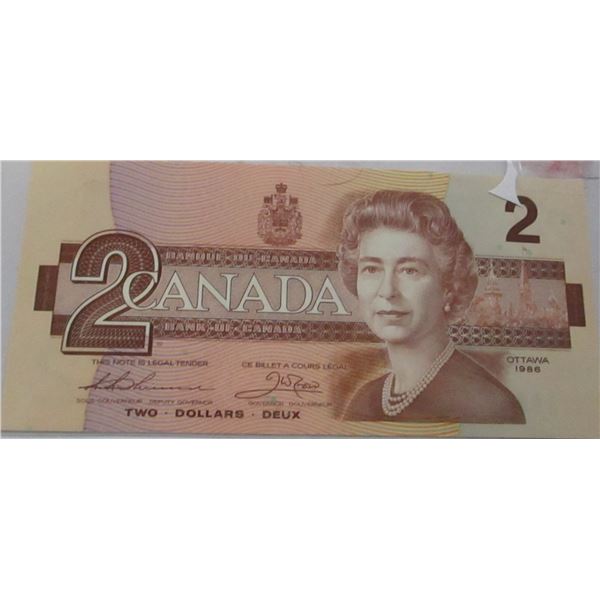 1986 CRISP UNCIRCULATED LEGAL TENDER CANADA $2 BILL