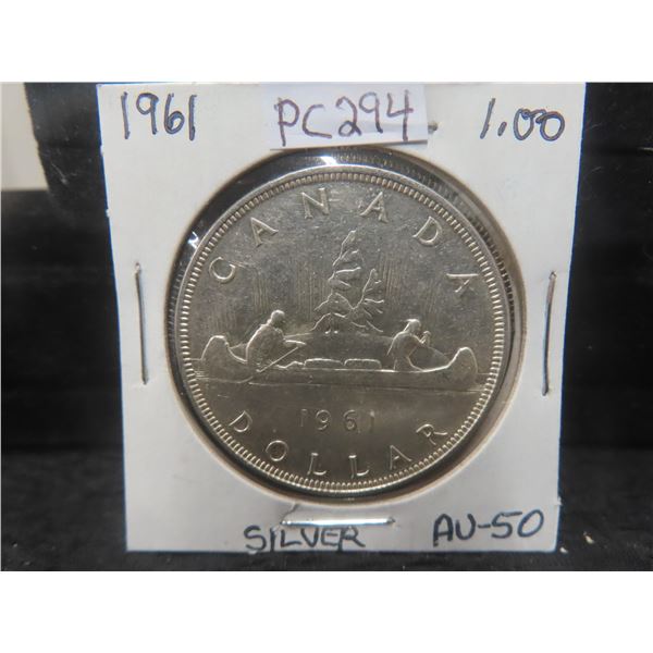 Canada Dollar 1961 A.U.50, .800 Silver 23.33 Grams.