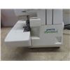 Image 4 : White Speedylock Serger Sewing Machine With Manual