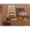 Image 1 : HO Gauge Train Cars Including Cabooses, Passenger Cars, Cargo, Engine, and Transformer