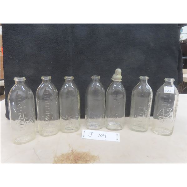 7 Antique Baby Bottles With Embossed Text And Images