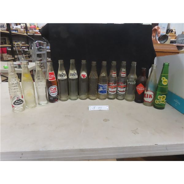 15 Soda Bottles: Uptown, Orange Crush, Ten-Hi, RC, Pure Spring, Tab, Coke With Product