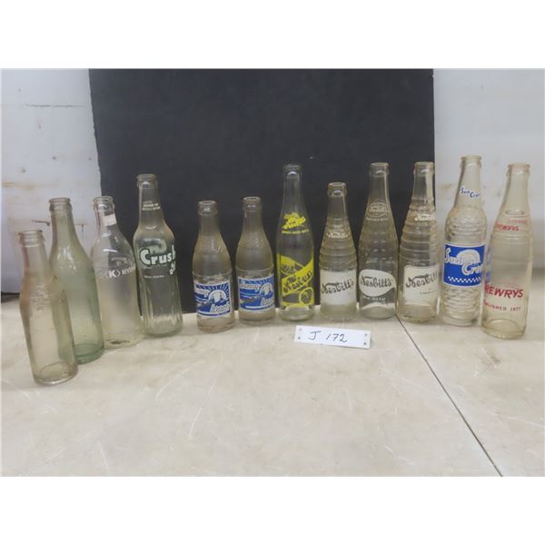 12 Soda Bottles: K, Nesbitt's, Sunnybrook, Drewrys