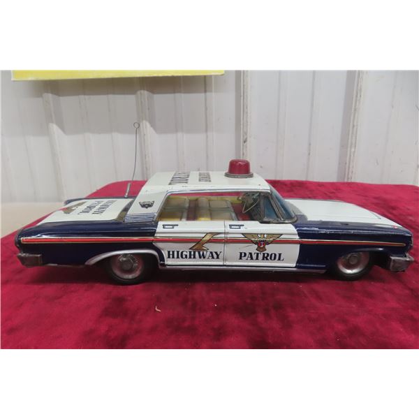 Cragstan Tin Litho Battery Highway Patrol Ford Police Car, 1960s, 12 1/2" Long