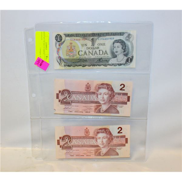 SHEET OF 2 $2 BILLS AND $1 CANADIAN