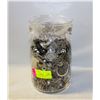 Image 1 : GLASS JAR OF SILVER TONED JEWELRY ASSORTED
