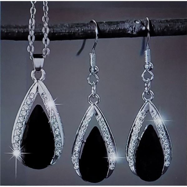 21) SILVER TONE AND BLACK CRYSTAL DROP