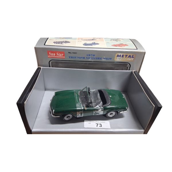 1:18 scale NIB die cast 1970 Triumph Spitfire MKIV