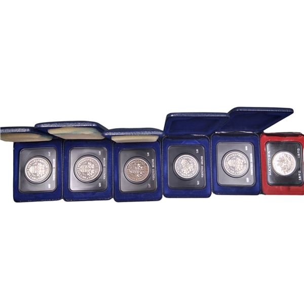 6 vintage Canadian collector coins in cases