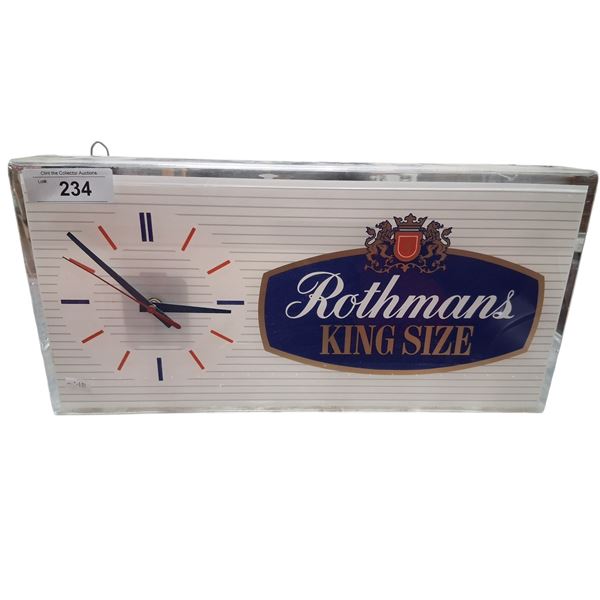 Vintage Rothman's clock 18"x9"