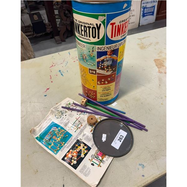 Vintage Tinker Toy building set in original tube, 14" tall