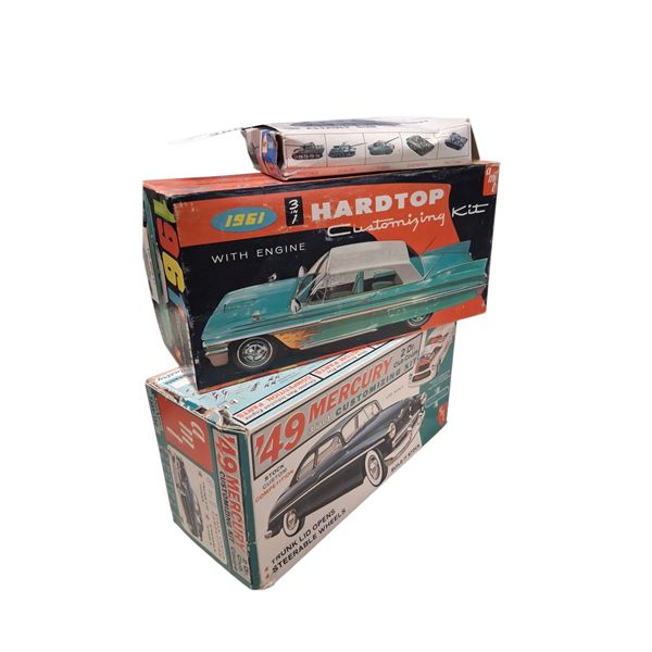 2 vintage model boxes with various pieces plus vintage tank model