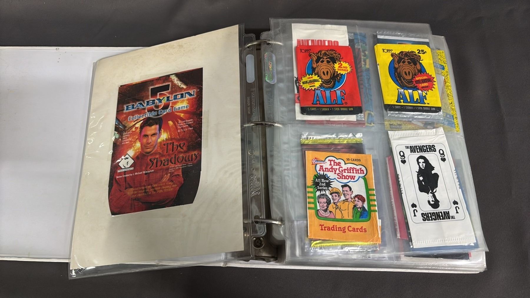 1 BINDER OF EMPTY TRADING CARD WRAPPERS & 1 BINDER OF TRADING CARD BOX TOPS