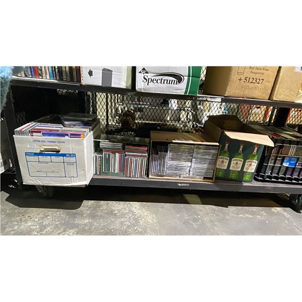 SHELF LOT OF ASSORTED CD BOXES