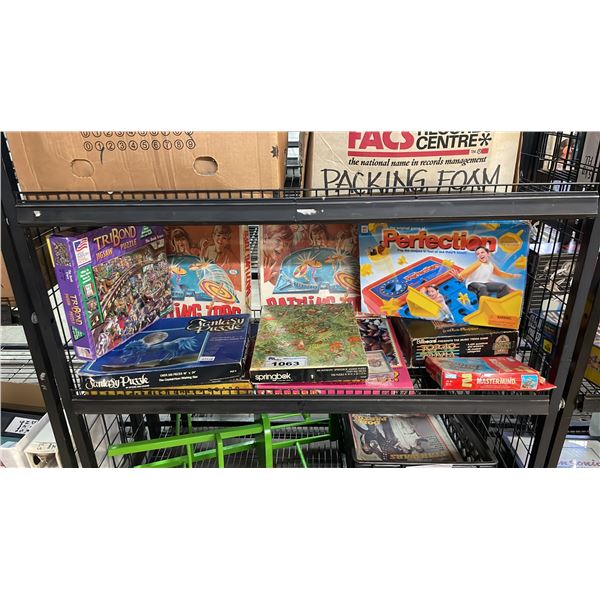 SHELF OF ASSORTED BOARD GAMES
