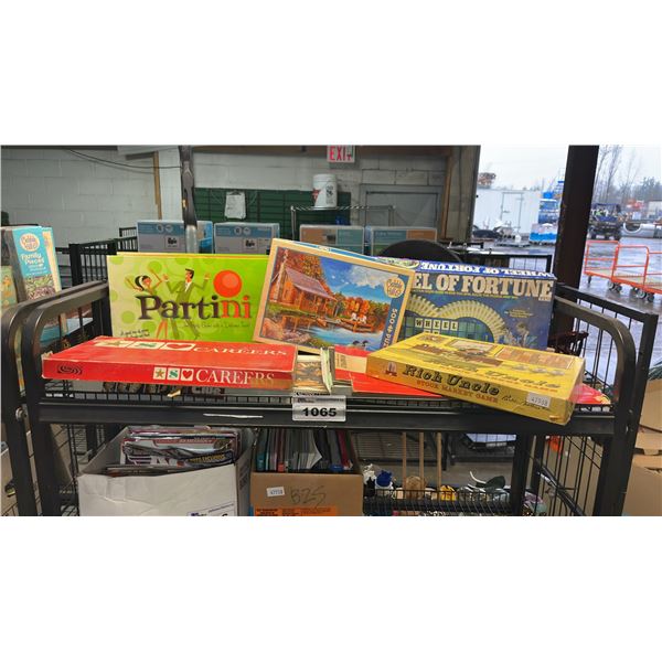 SHELF OF ASSORTED BOARD GAMES