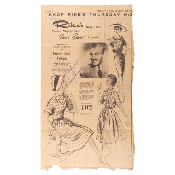 A Cesar Romero Signed Newspaper Clipping.