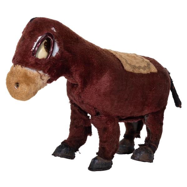 A 1950s Donkey Wind-Up Toy.